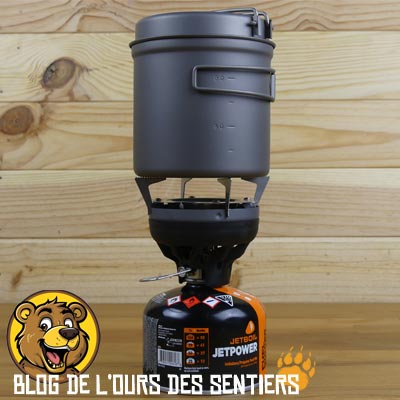 une popote sans échangeur thermique pourra être placée sur un réchaud flash équipé d'un pot support universel